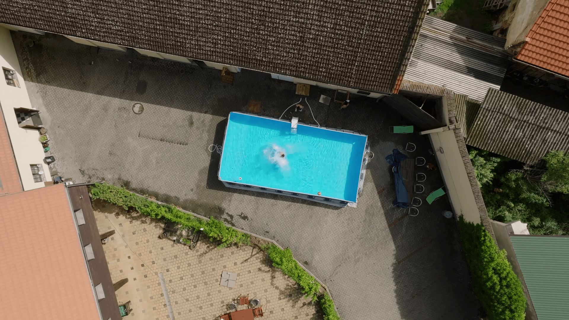 The outdoor pool in the courtyard of the accommodation, seen from above